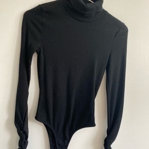 Black turtleneck bodysuit